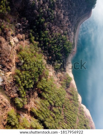 Top-down view of a cliff leading to Arda river