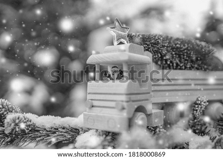 Christmas tree concept. Merry Christmas and happy new year concept. Creative layout made of Christmas tree. Christmas tree on toy car. Nature New Year concept