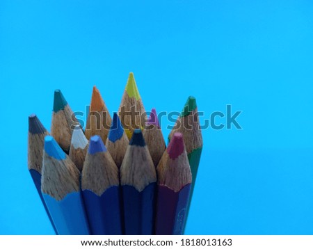 color pencils, awesome picture , sketch pencils with blue background