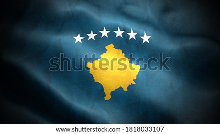 close up waving flag of kosovo. flag symbols of kosovo.