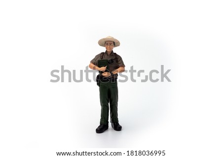 Miniature people worker, explorer and travel concept in variety action on white background with space for text