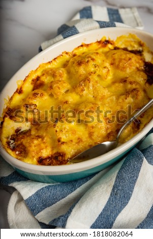 Cauliflower cheese gratin in baking dish