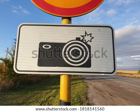 road sign speed camera and road works