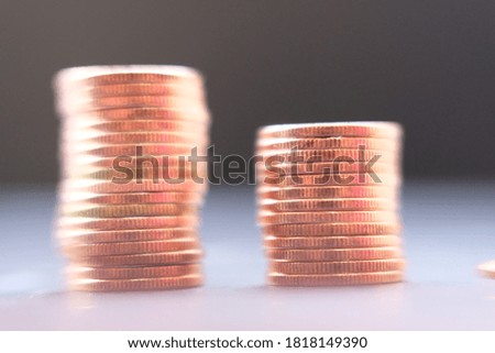 Stack of golden coins on black background and Business growth strategy of money concept