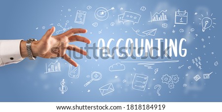 Close-Up of cropped hand pointing at ACCOUNTING inscription, modern business solution concept