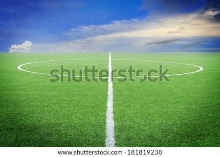 soccer field with blue sky