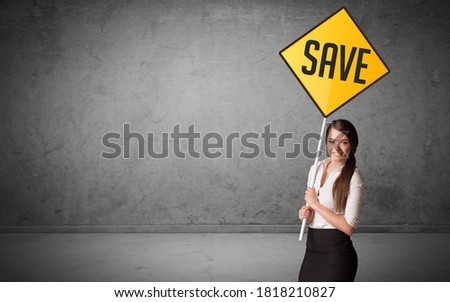 Young business person holding road sign with SAVE inscription, new rules concept