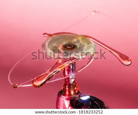 Closeup of a dental handpiece with teeth polishing heads. Against the background of frozen water drops. dental photography Royalty-Free Stock Photo #1818233252