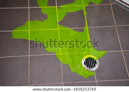 Shower leaking indicator dye flood test to check for leaks withing the shower pan base Royalty-Free Stock Photo #1818253769