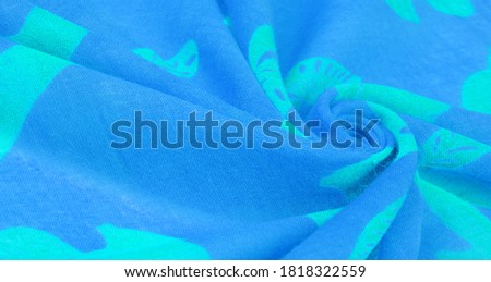 Thin blue cotton fabric with squirrel, marten, sable print. decor modern, textile art, design, texture, background, pattern,