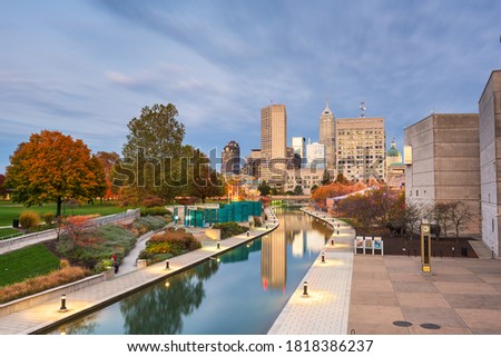 Indianapolis, Indiana, USA skyline and canal at dusk in autumn.