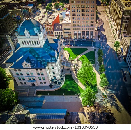 Aerial view of the historic center in downtown Lexington, Kentucky USA with interesting light reflections from the surrounding office buildings Royalty-Free Stock Photo #1818390533