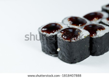 Japanese traditional food. Sushi rolls with fresh tuna avocado and cream cheese and soy sauce