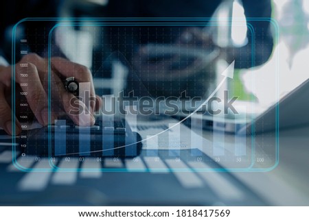 Double exposure of business hands working on laptop computer with digital network online virtual chart, Abstract icon, Business strategy concept, Background toned image blurred.
