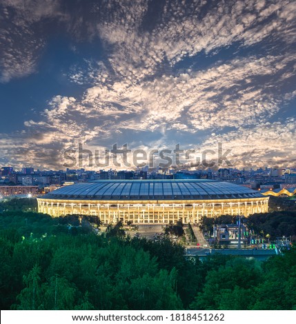 View of Luzhniki stadium from Sparrow Hills or Vorobyovy Gory observation (viewing) platform against the background of a beautiful sunset. Moscow, Russia Royalty-Free Stock Photo #1818451262