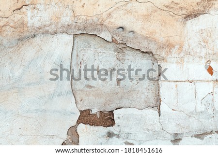 Texture of weathered cracked rustic wall as abstract background