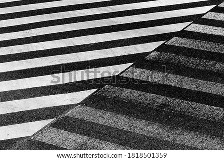 Black and white stripe of the  pedestrian crossing