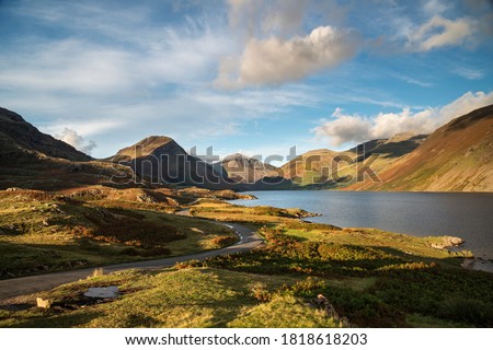 Stunning late Summer landscape image of Wasdale Valley in Lake District, looking towards Scafell Pike, Great Gable and Kirk Fell mountain range Royalty-Free Stock Photo #1818618203