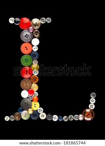 Buttons alphabet - letter L - isolated on black Royalty-Free Stock Photo #181865744