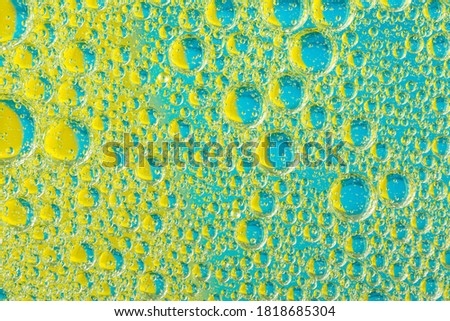 Yellow and blue psychedelic oil and water abstract
