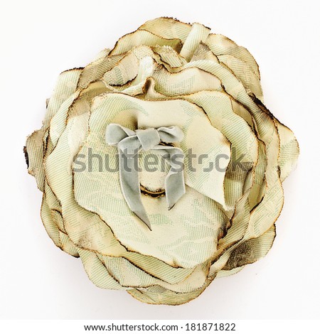 Artificial white flower of silk isolated on white background