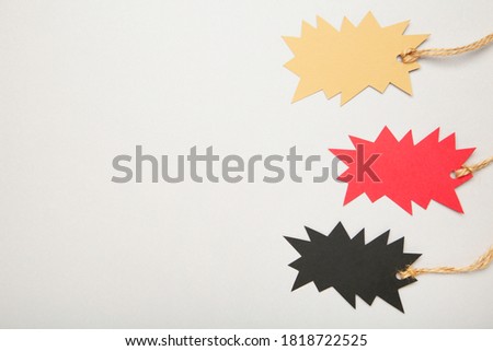Price tag on grey background. Black friday. Top view