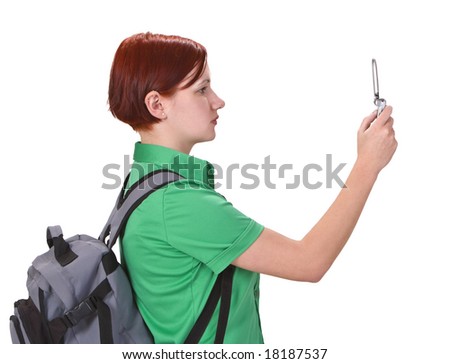 Close-up of a teenager taking photos using a mobile phone camera-profile.