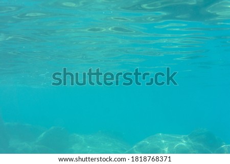 Turquoise water of the Adriatic Sea. Underwater horizontal photography. Backgrounds and textures, natural environment, nature conservation and ecology concept. Makarska, Croatia, Europe.