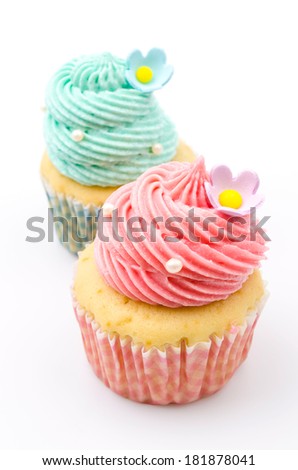Vanilla cupcakes isolated white background