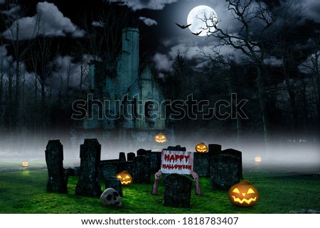 a halloween background with a cemetry with pumpkins and a castle