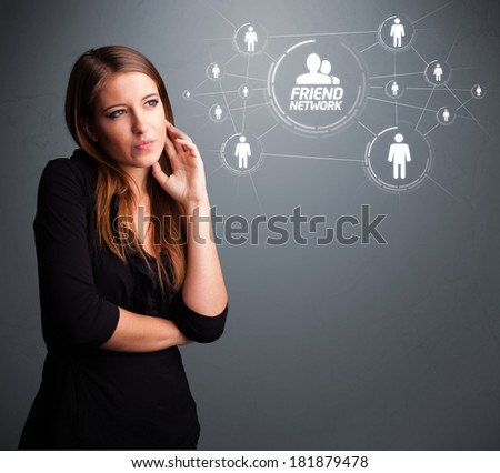 Attractive young girl looking at modern social network