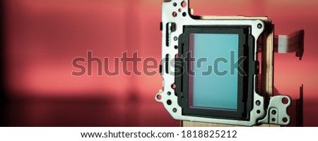 modern CMOS  camera Image sensor. digital dslr camera cmos sensor removed from camera. Royalty-Free Stock Photo #1818825212