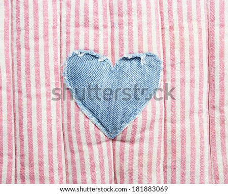 Love hearts on vintage fabric background 