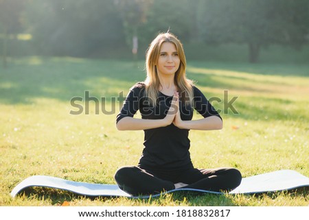 yoga woman on green park