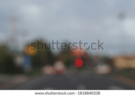 Blur image traffic lights and cars.