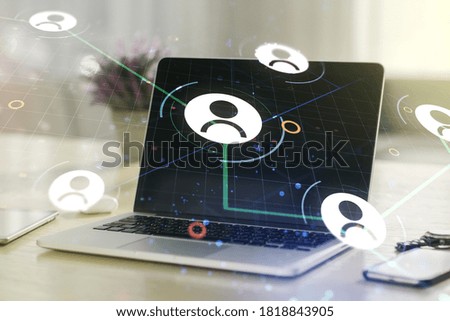 Social network media concept with modern computer on background. Double exposure
