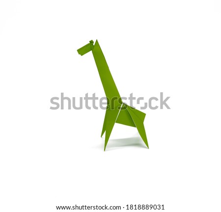 Green Origami Giraffe isolated on the white background 