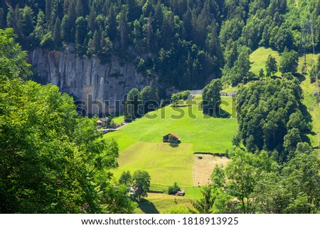 Lonely house near mountain village Lauterbrunnen, Bernese Oberland, Switzerland.
