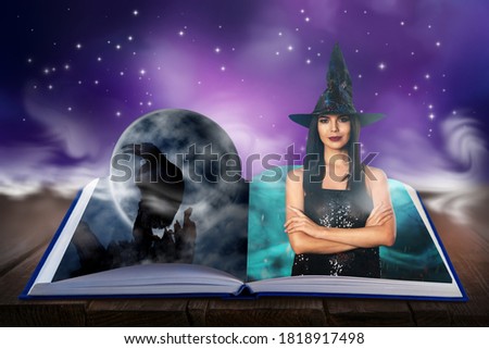 Fantasy world. Open book of fairytales with witch and black crow on pages