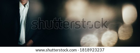 Businessman on abstract blur light effect background
