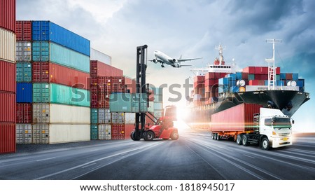 Business logistics and transportation concept of containers cargo freight ship and cargo plane in shipyard at dramatic blue sky, logistic import export and transport industry background Royalty-Free Stock Photo #1818945017