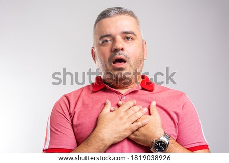 Sick mature man coughing at home. Asthma symptoms with coughing. Asthmatic problems of medical disease, shortness breathing, cough and wheezing Royalty-Free Stock Photo #1819038926