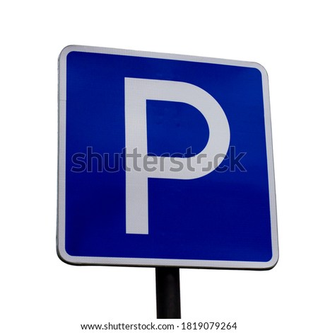 Parking space sign on a pole close up on a white background, road sign, P symbol on blue.