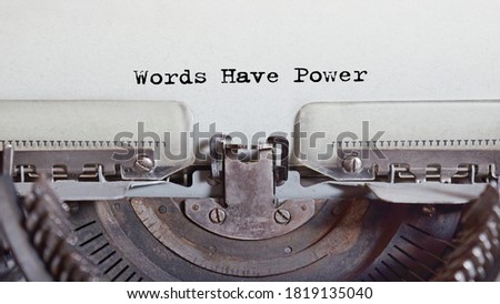 The text is typed on paper by an antique typewriter. Vintage inscription, retro style, grunge, concept.