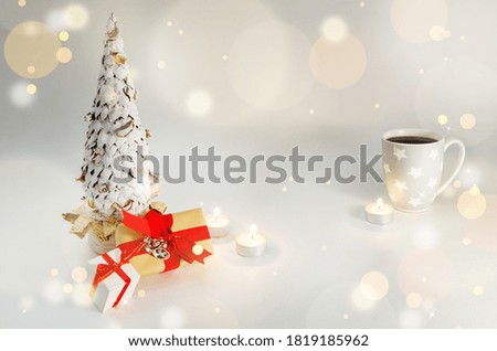 Christmas table decoration banner. White hand made fir. Craft paper red gift boxes recycle nature materials candles lights tea cup white background. Minimalist new year Xmas concept copy space mockup