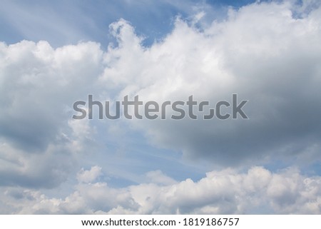 Bright clouds against the blue sky

