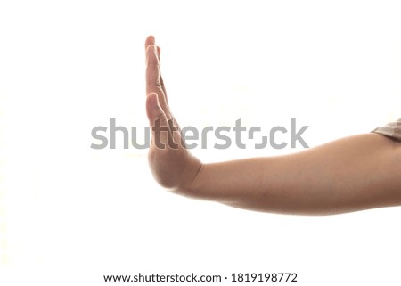 Side view of female hand showing stop gesture, isolated on white background, copy space 