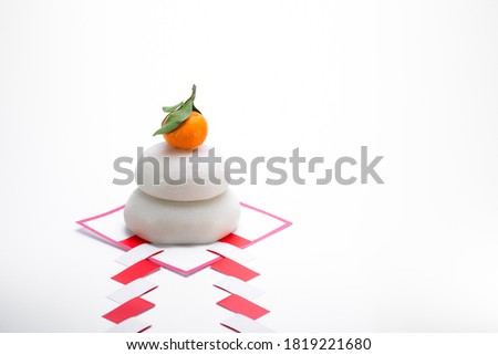 KAGAMIMOCHI is offering to God.A round rice cake means harmony.Have a wish for a harmonious age. Royalty-Free Stock Photo #1819221680