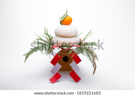 KAGAMIMOCHI is offering to God.A round rice cake means harmony.Have a wish for a harmonious age. Royalty-Free Stock Photo #1819221683