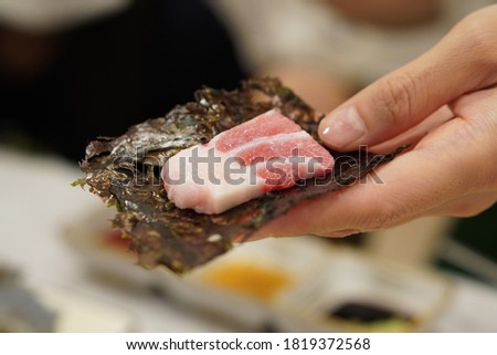 a picture of tuna sashimi cooking
